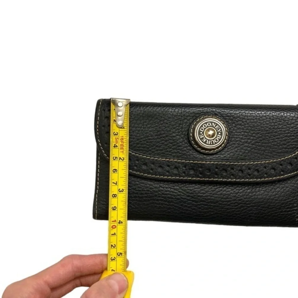Dooney and Bourke rare perforated black pebbled leather 2 piece wallet set